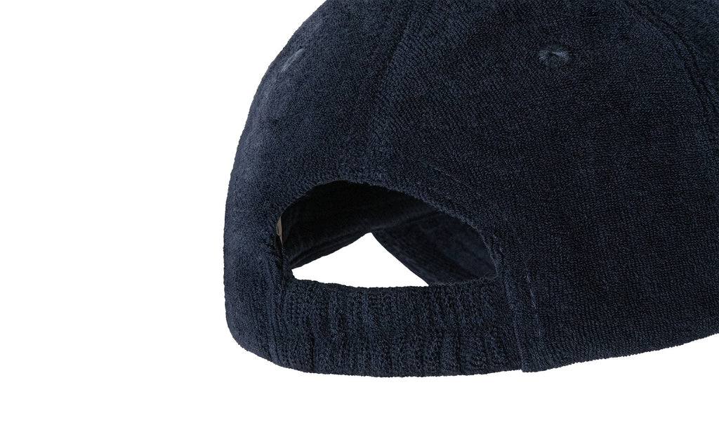 "terry cloth cap", "organic cotton", "moisture-wicking", "breathable", "adjustable", "navy", "casual", "versatile", "premium", "quality"